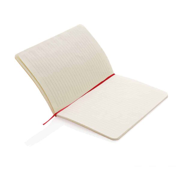 Block notes aperto con segnapagina rosso