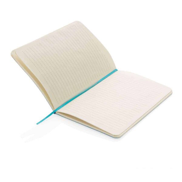Block notes aperto con segnapagina azzurro